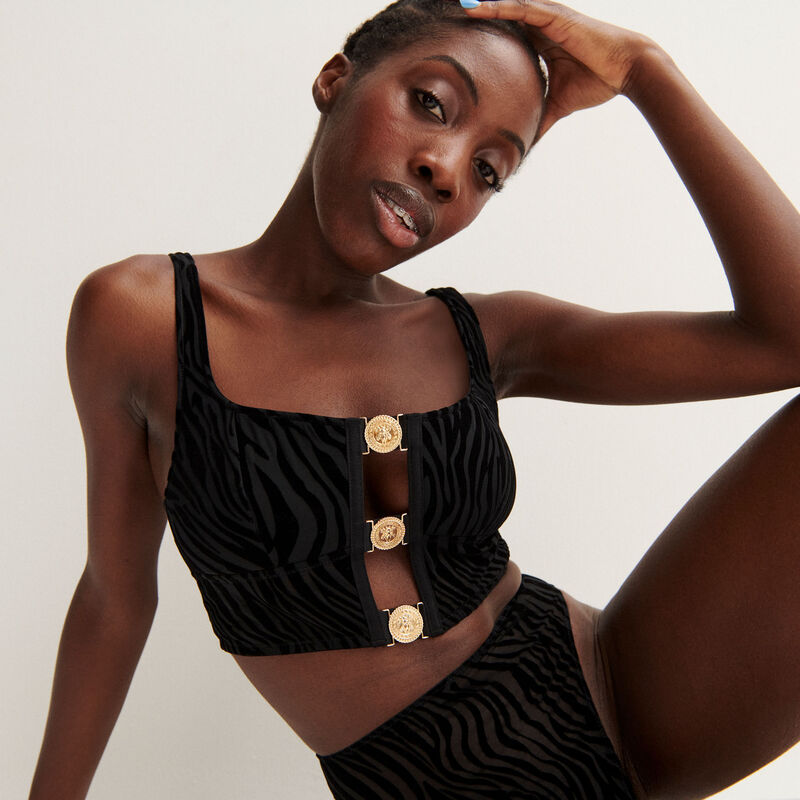 Aya x undiz bustier met zebraprint met medaillebandjes - zwart Aya x undiz bustier met zebraprint met medaillebandjes - zwart;