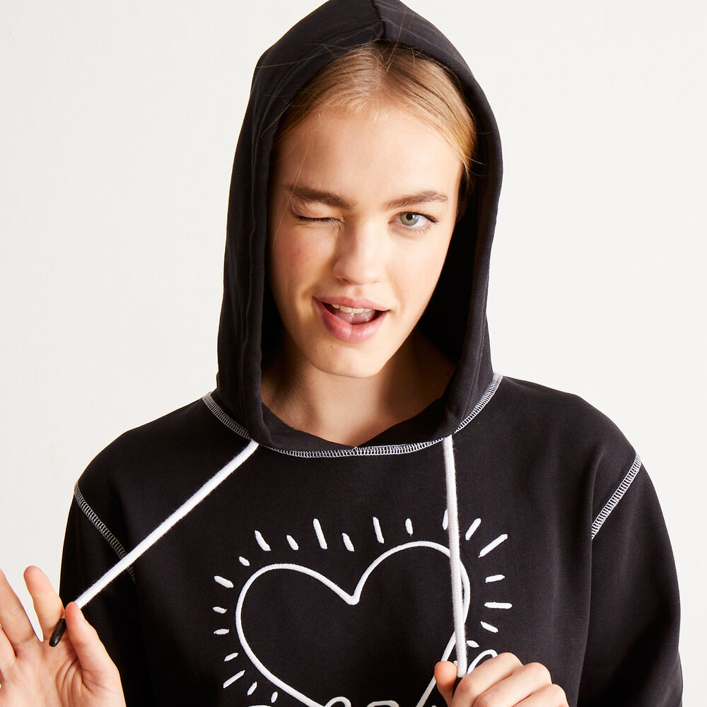 Sweater met keith haring hartjesmotief - zwart zwart.